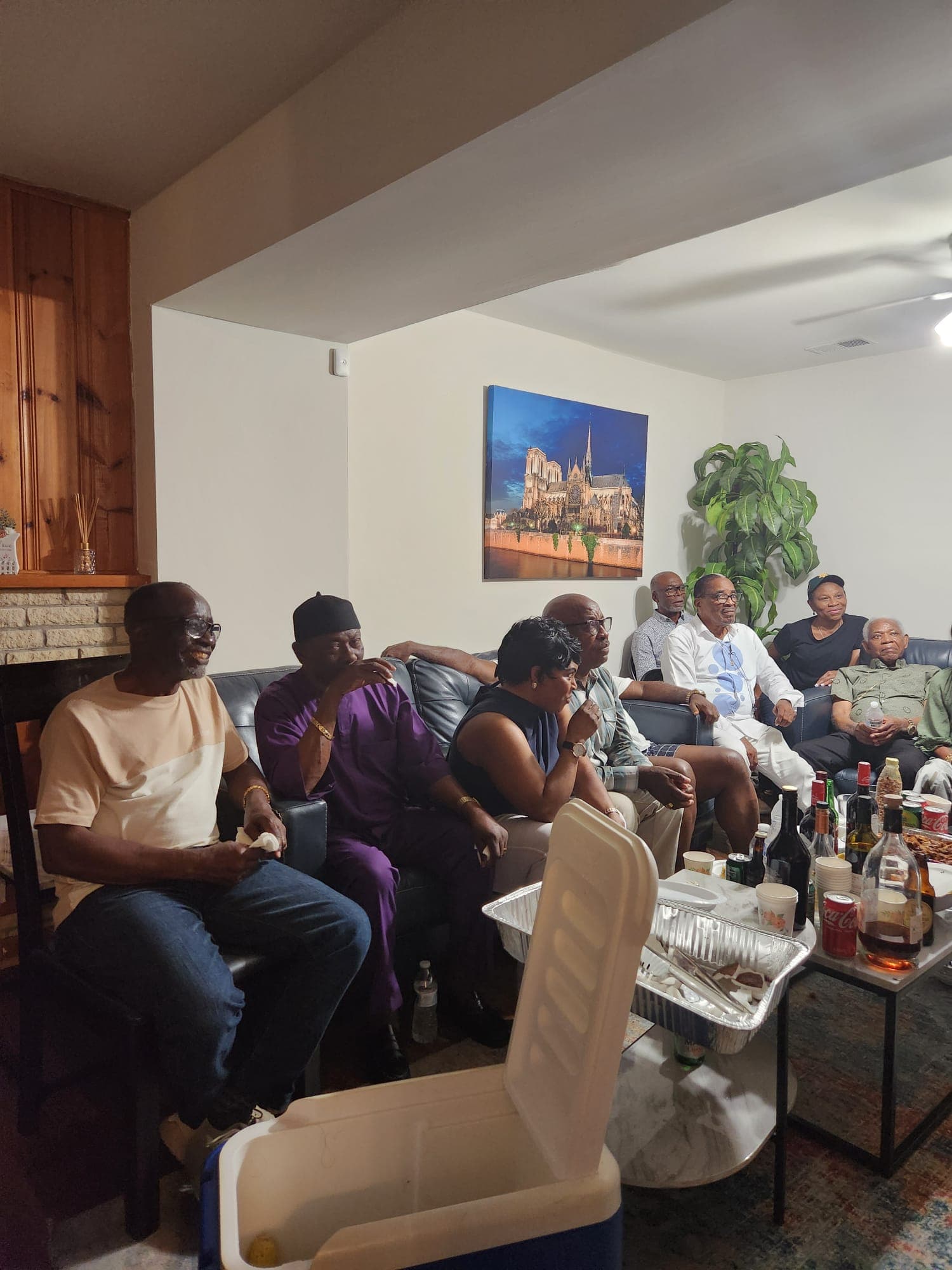 Members relaxing together in a living room