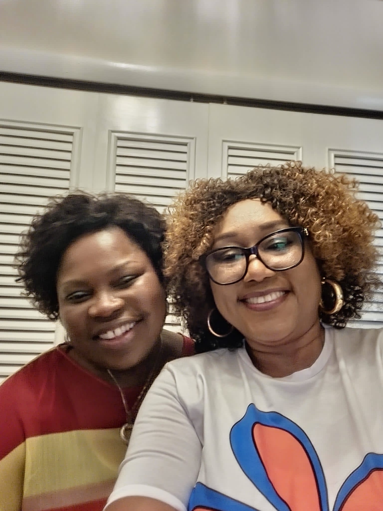 Two women smiling for a selfie